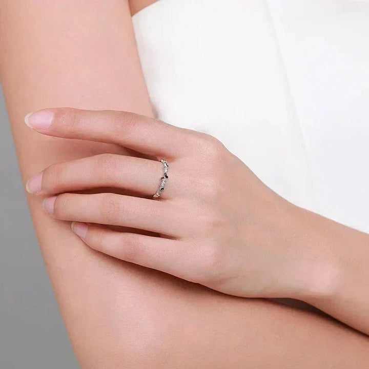 Hand wearing Butterfly Elegance Zircon Ring- TM & CO. JEWELS,delicate 925 silver ring with leaf design, minimalist women's jewelry.