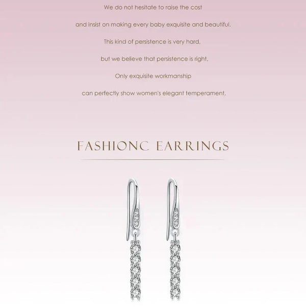 Silver chain earrings on a light pink background with text
