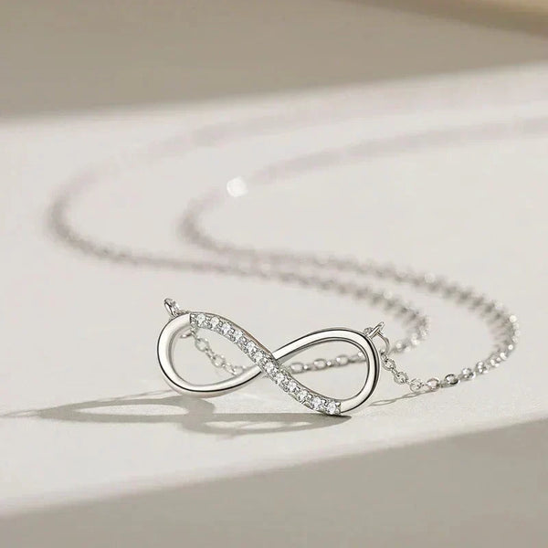 Silver infinity necklace on a light background-Forever Linked Pendant - TM & Co. Jewels