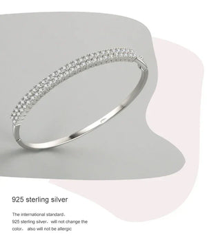 925 sterling silver bracelet with sparkling cubic zirconia stones on neutral background