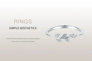 925 silver leaf ring with small diamonds, modern minimalist women’s jewelry on light background