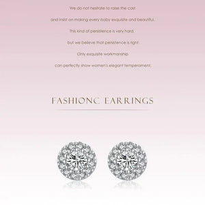 Pair of diamond stud earrings on a light pink background with text.