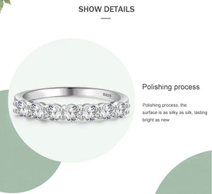 Silver ring with diamonds on a white background