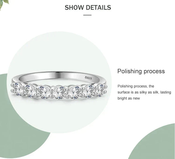 Silver ring with diamonds on a white background