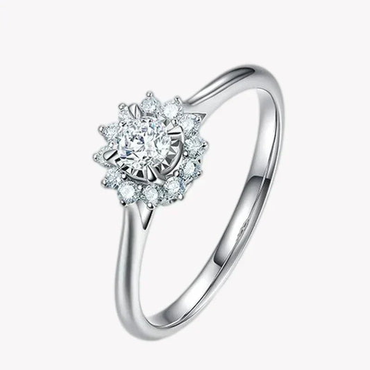 Silver ring with diamond on a white background