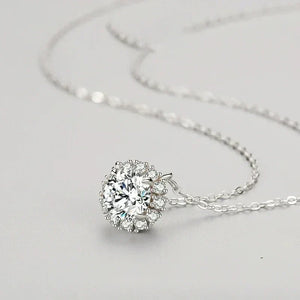 Luminous Circle Sterling Necklace - TM & Co. Jewels-Silver necklace with a round, clear gemstone pendant on a light gray background.