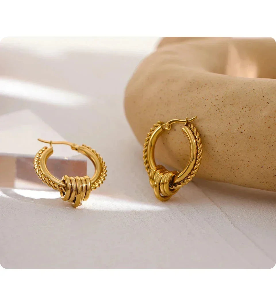 Twisted Huggie Earrings with Gold PVD Plating - TM & Co. Jewels