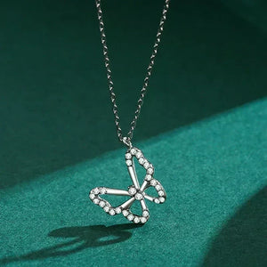 Silver butterfly necklace on a green background-Butterfly Elegance Necklace - TM & Co. Jewels