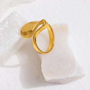 18K gold-plated abstract statement ring with modern sculptural design on white background