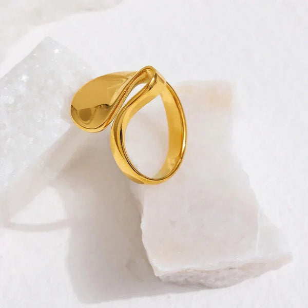 18K gold-plated abstract statement ring with modern sculptural design on white background