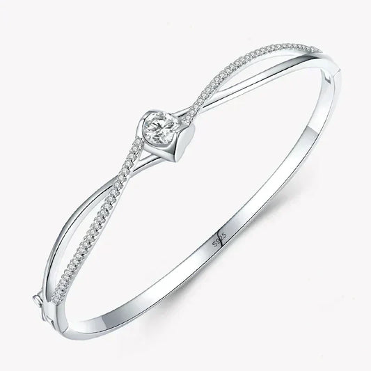Elegant 925 silver bangle with heart-shaped centerpiece and sparkling cubic zirconia accents