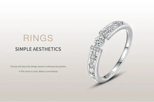 925 silver ring with central round gemstone and star accents, elegant minimalist jewelry design
