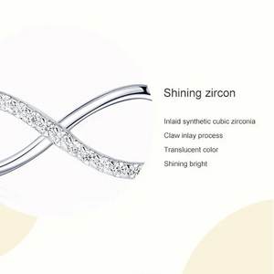Infinite symbol necklace with zirconia stones on a white background