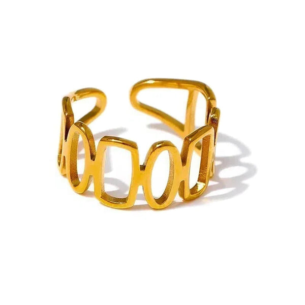 18K gold-plated open geometric ring with rectangular and oval cutout design on white background
