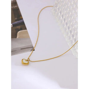 18K gold-plated heart pendant necklace on a delicate chain, minimalist jewelry