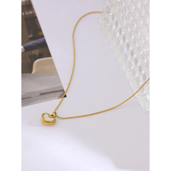 18K gold-plated heart pendant necklace on a delicate chain, minimalist jewelry