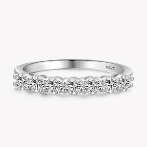 Silver ring with diamonds on a white background