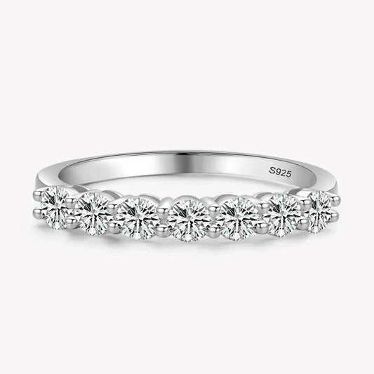 Silver ring with diamonds on a white background