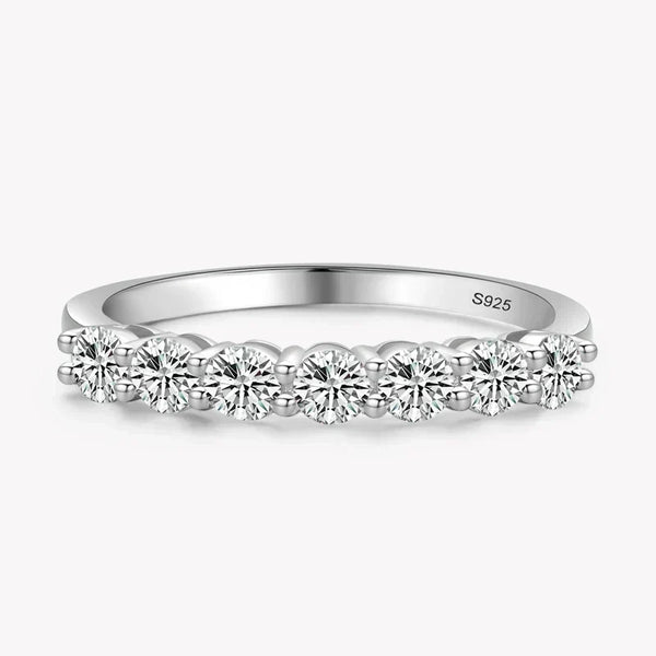 Silver ring with diamonds on a white background