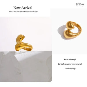 18K gold-plated sculptural open ring for women on white stone background