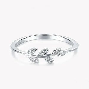 925 silver leaf design ring with sparkling stones on white background