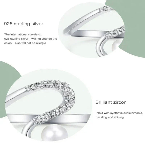 925 sterling silver ring with cubic zirconia and a pearl detail, elegant modern design
