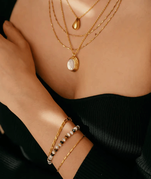 Layered necklaces with natural gemstone pendants from TM & Co. Jewels' GEMS WITH MEANING Natural Spark collection.