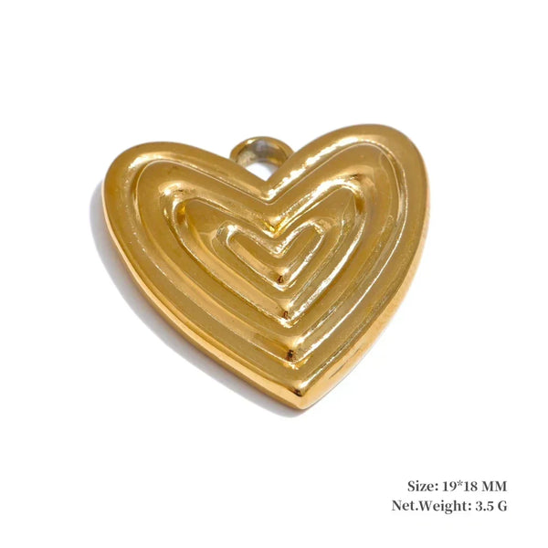 Gold heart-shaped pendant on a white background