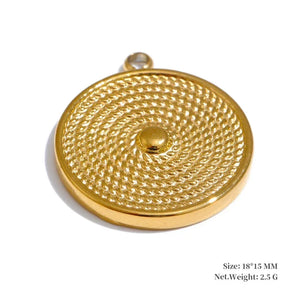 Gold circular pendant with intricate design on a white background