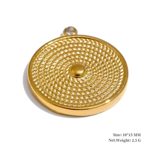 Gold circular pendant with intricate design on a white background