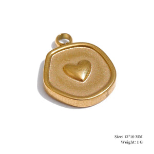 Gold pendant with a heart design on a white background