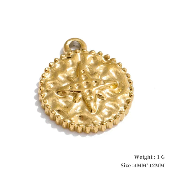 Gold pendant with star design on a white background
