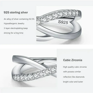 Close-up of a 925 sterling silver ring with cubic zirconia stones, simple elegant design.