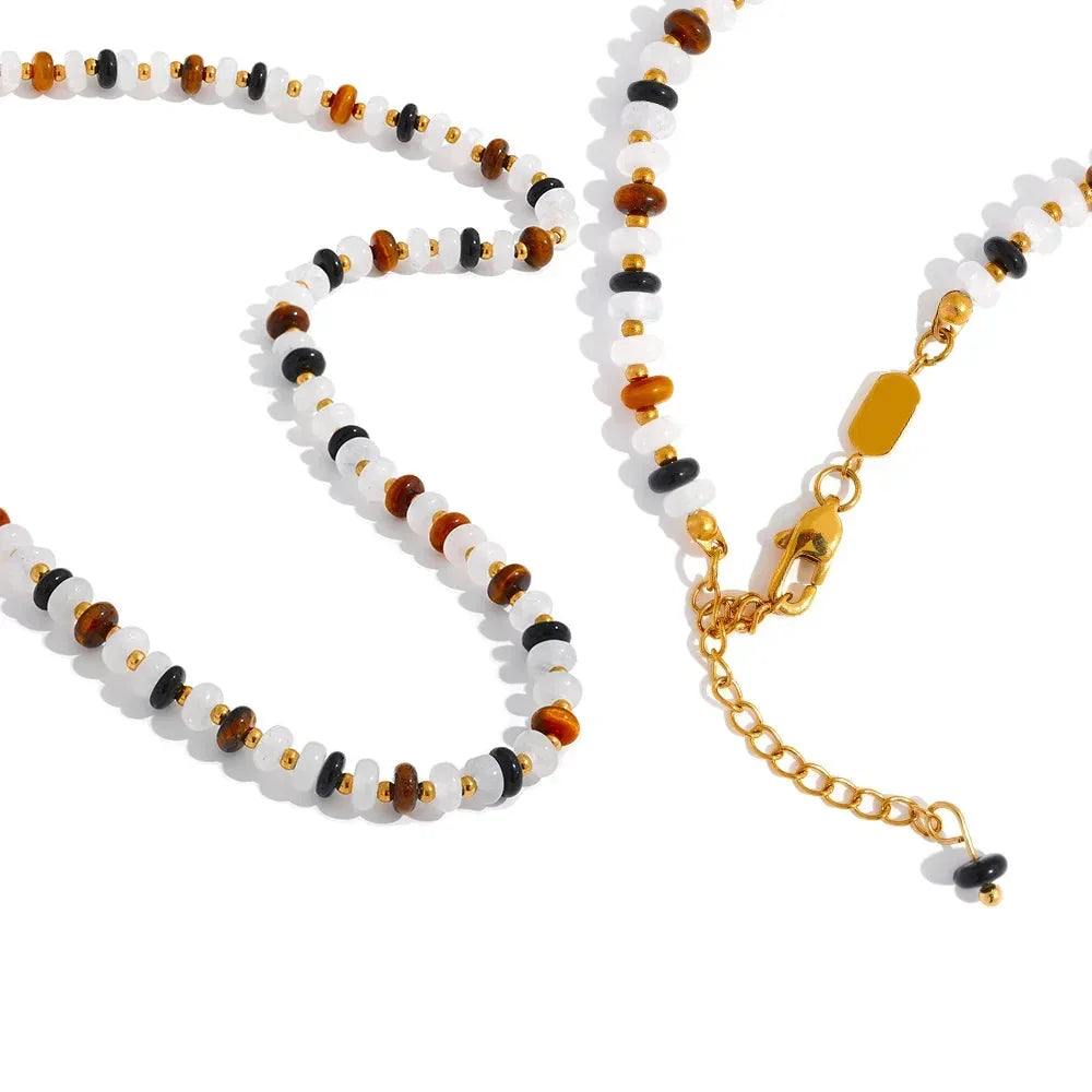 Beaded necklace with gold chain and 'Yol'up Charm Jewelry' logo on a white background