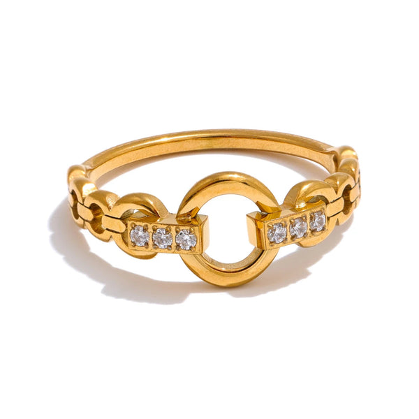 Gold ring with diamond accents on a white background.