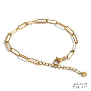 Gold chain bracelet on a white background