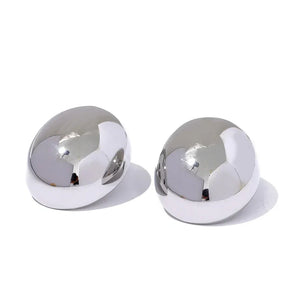 Pair of silver spherical objects on a white background
