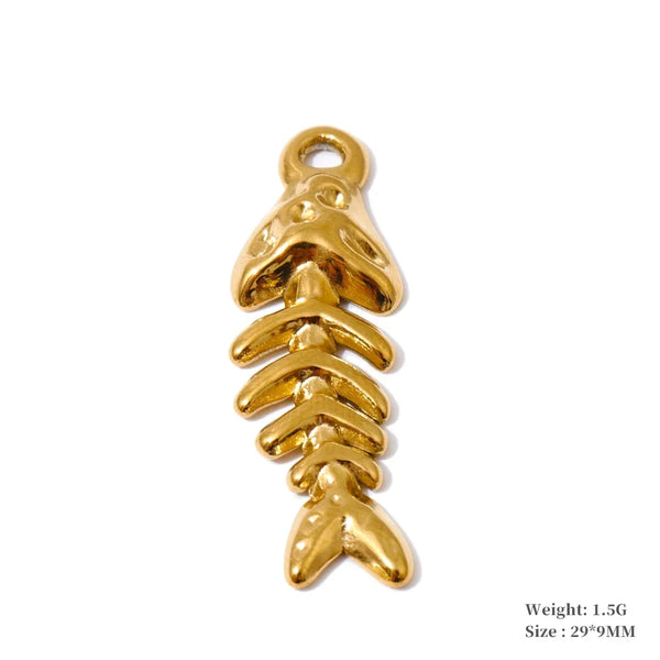 A gold-colored fish skeleton charm with a small loop at the top, shown on a plain white background with text indicating its weight and size.