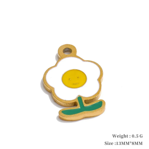 Fried egg-shaped pendant with a yellow center and green shadow on a white background