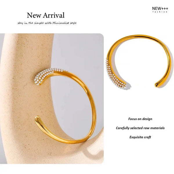 Gold bracelet with pearl accents on a mannequin wrist, labeled 'New Arrival' by NEW++ Fashion.