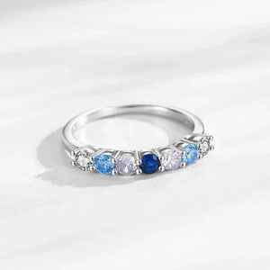 Silver ring with colorful gemstones on a light gray background-Crystal Spark Ring - TM & Co. Jewels