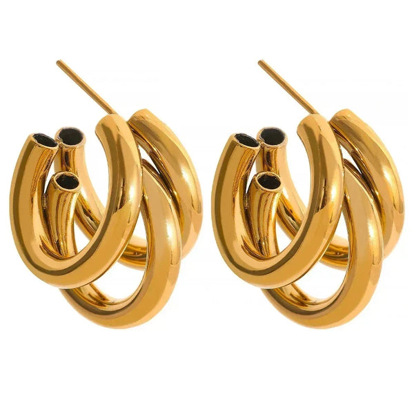 Chunky triple hoop gold-plated statement earrings for women on white background