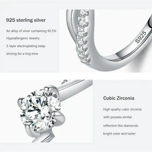 Close-up of a 925 sterling silver ring with cubic zirconia stones, showing detailed design and high luster.