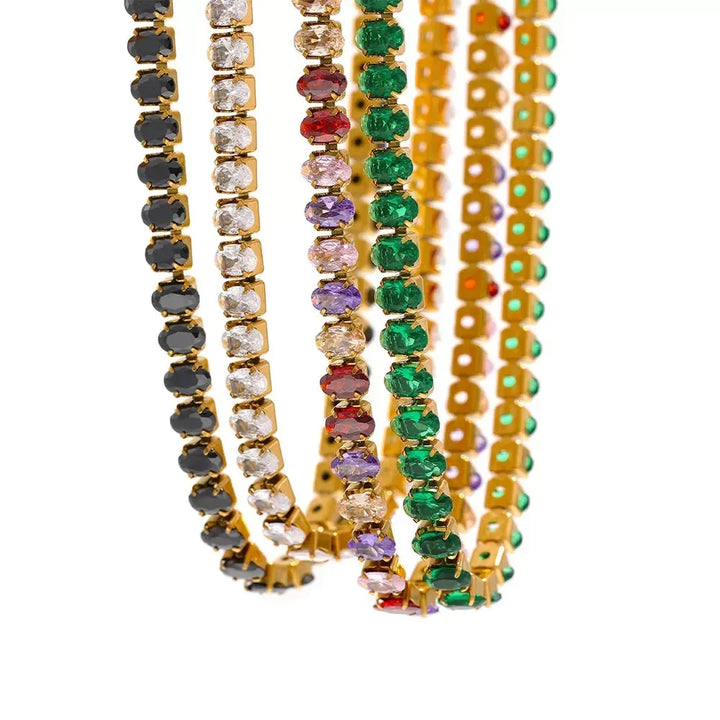 Set of colorful beaded necklaces on a white background.