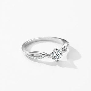 925 silver ring with round center stone and pavé accents on white background