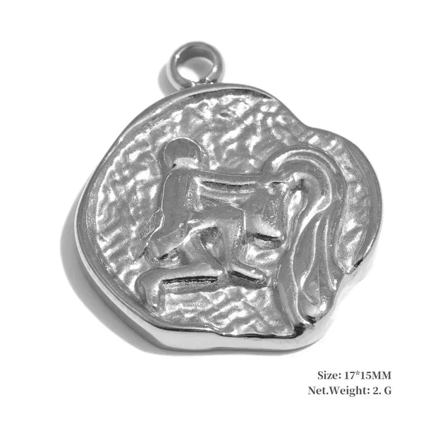 Silver pendant with a lion design on a white background