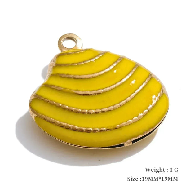 Yellow shell-shaped pendant with gold accents on a white background