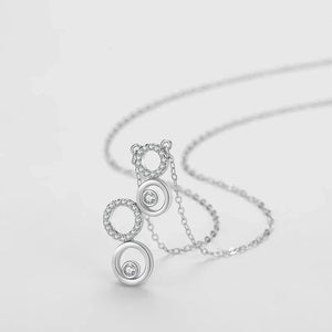 Silver necklace with a unique pendant design on a light gray background-Shining CZ Bubble Pendant Necklace - TM & CO. JEWELS 