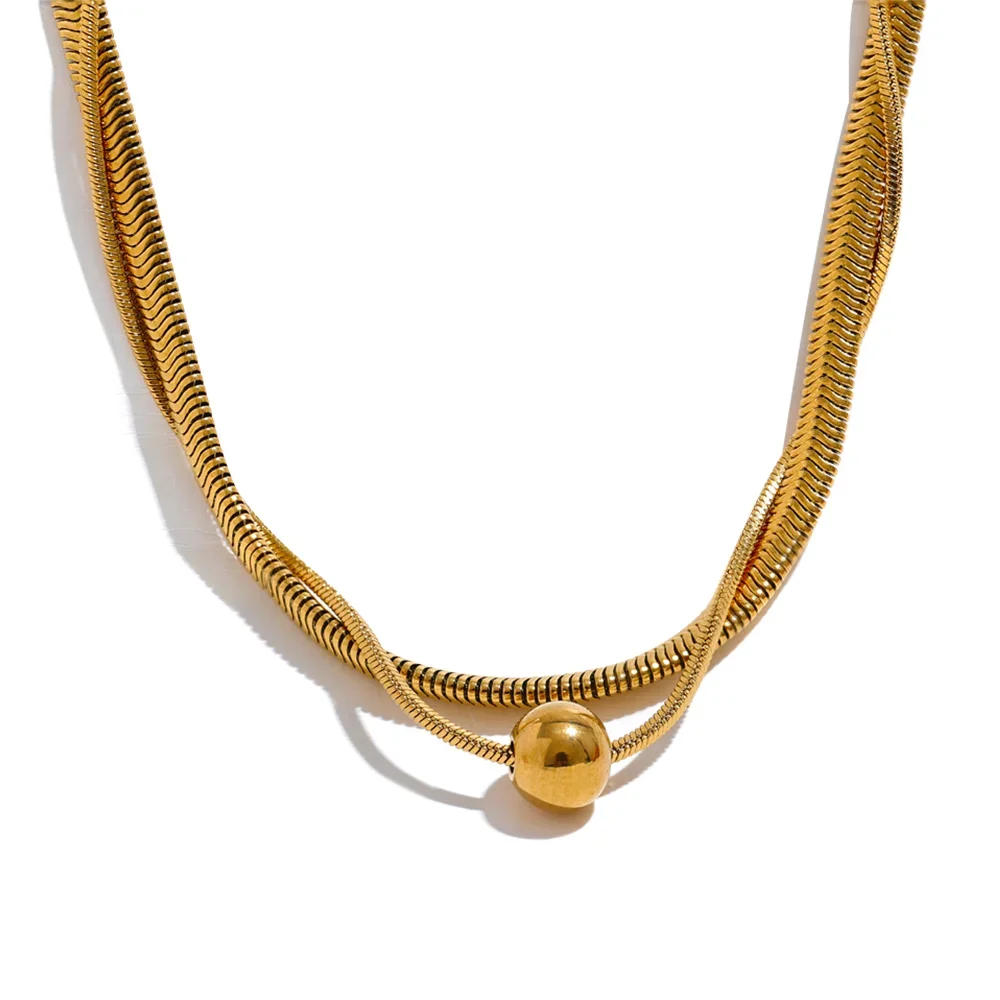 Gold necklace with a spherical clasp on a white background.