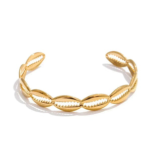 Gold bracelet on a white background